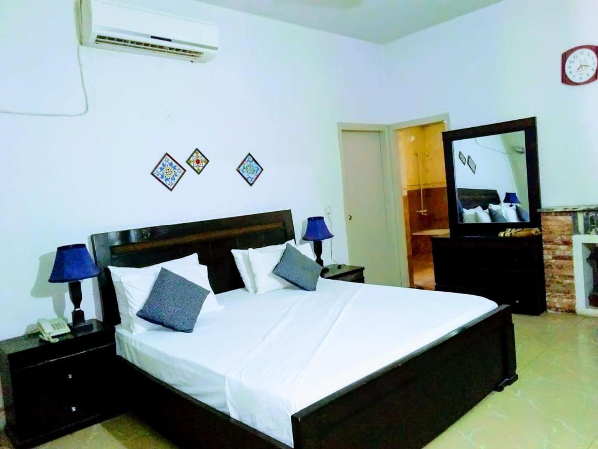 Pyramid International Guest House Islamabad Kamer foto