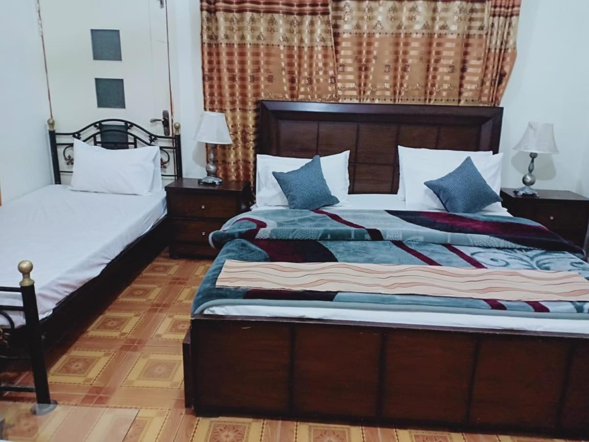 Pyramid International Guest House Islamabad Buitenkant foto